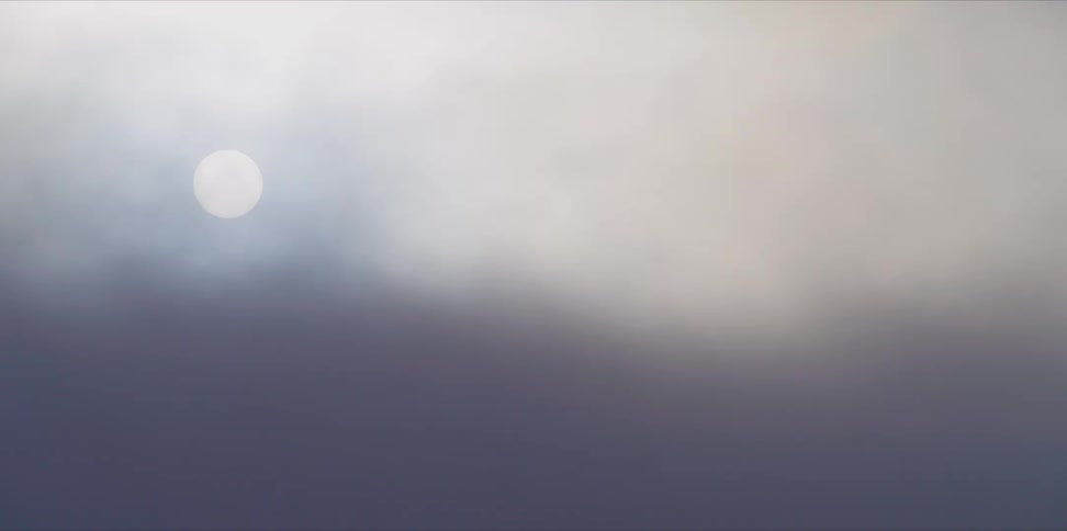 The sun is covered by clouds