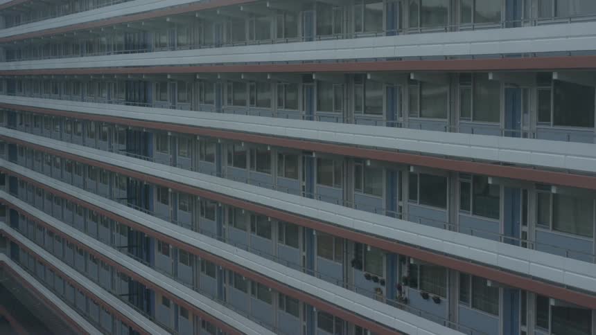 A building with windows and balconies