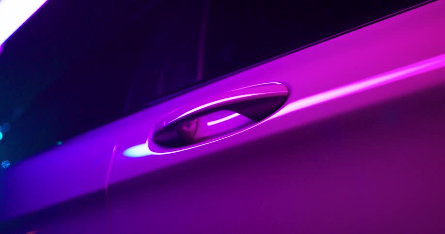 The door handle of a purple car