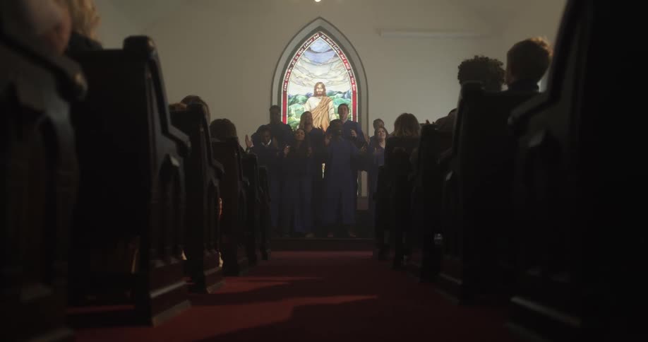 People are singing and celebrating in church