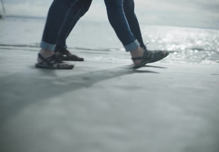 People walk on the beach