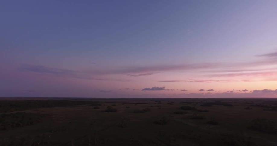 View of a large field at sunset