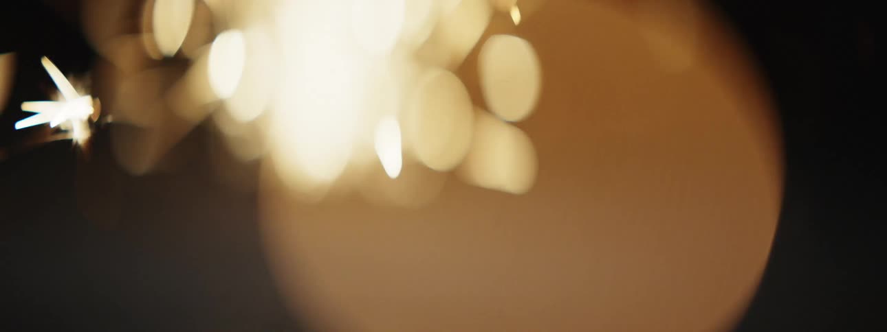 Sparks blaze into life and spray outwards
