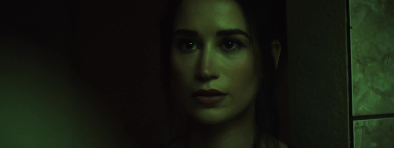 A woman is standing in a room