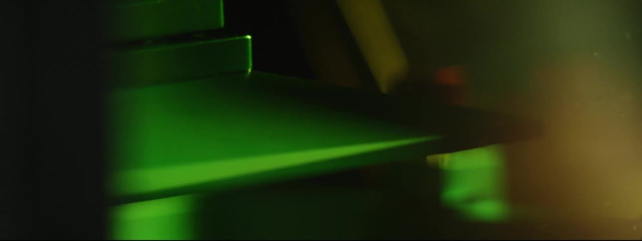 A green plastic that looks like a press