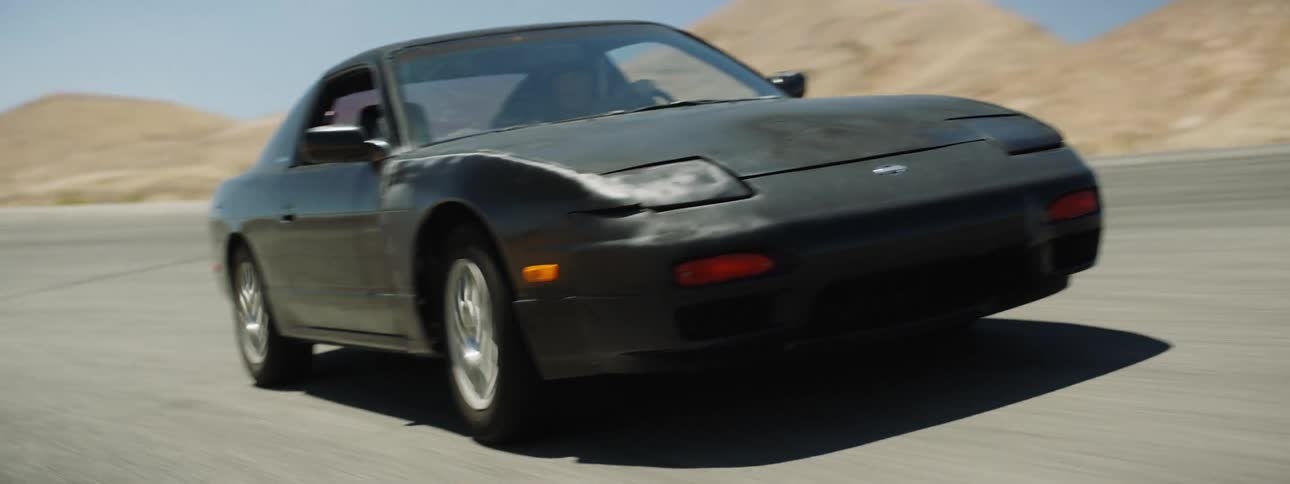 A man racing a car