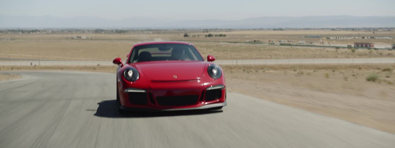 A sports car driving on a track