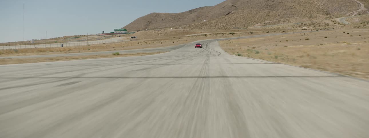 Cars are driving in a rural area