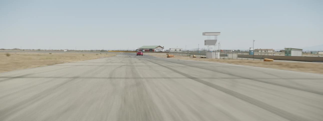 A sports car driving on a track