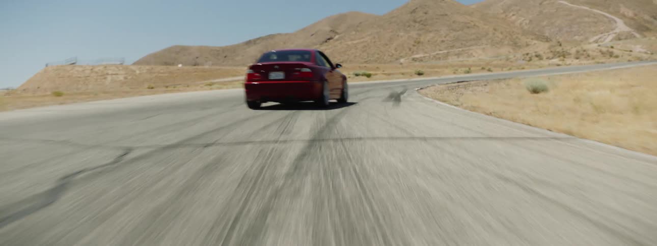The car travels down the road