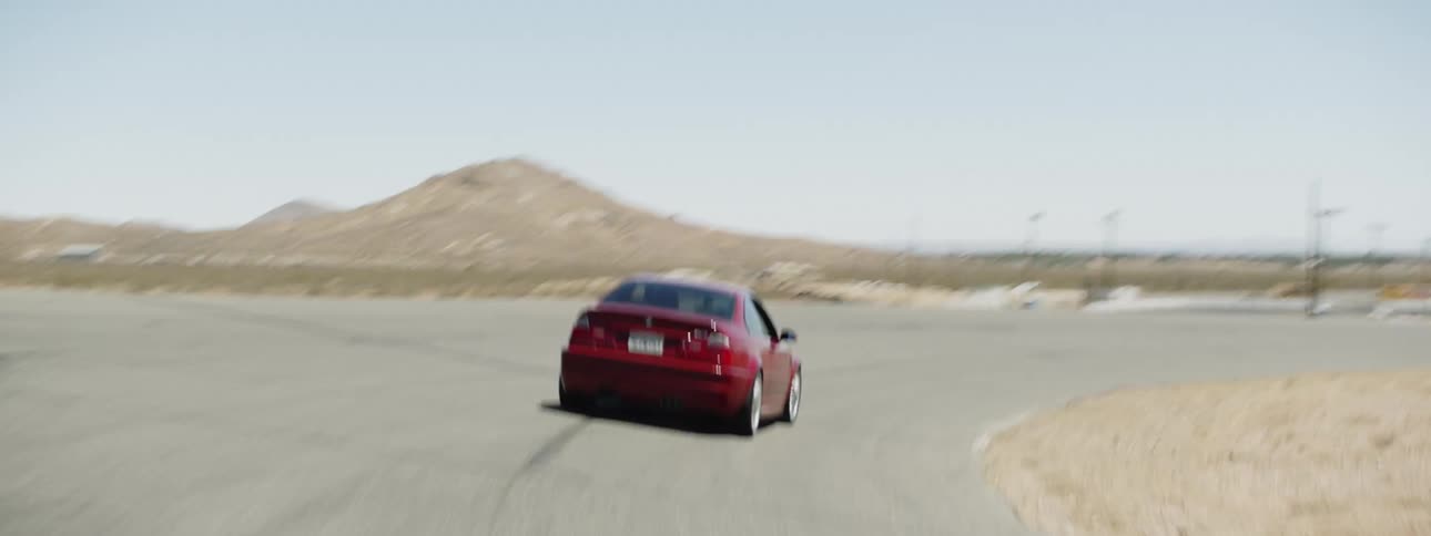 A sports car driving on a track
