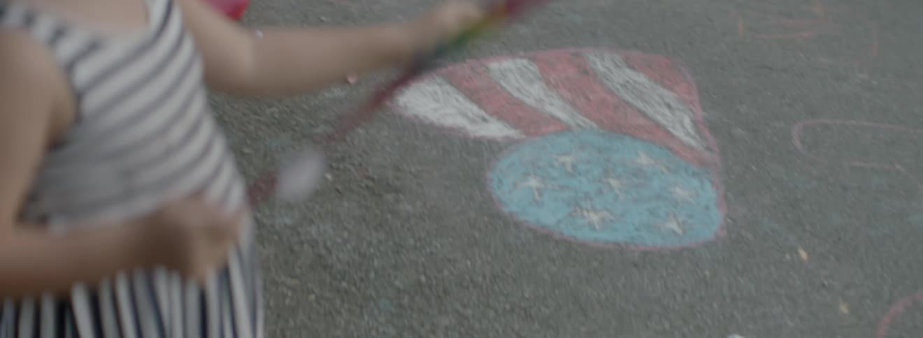 A little girl holding fireworks