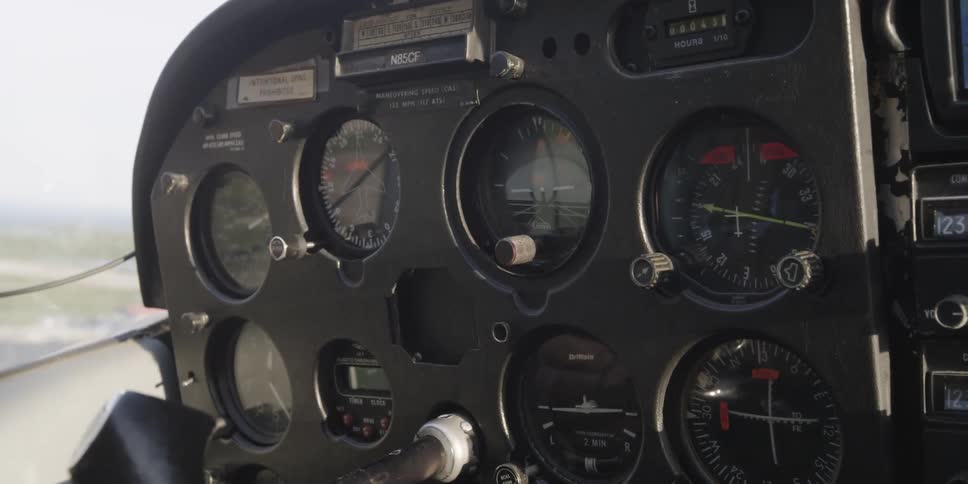 The control panel in the cockpit of a small plane