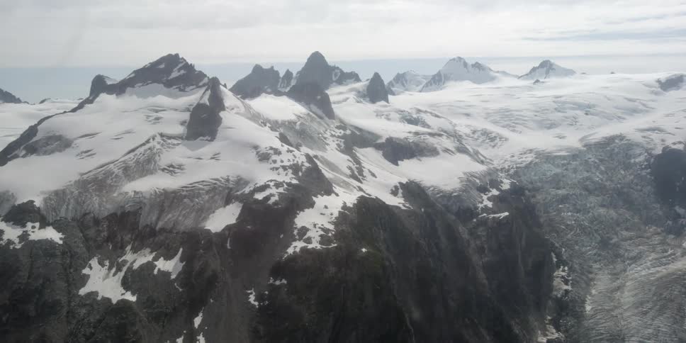Aerial view of snow-covered mountain peaks