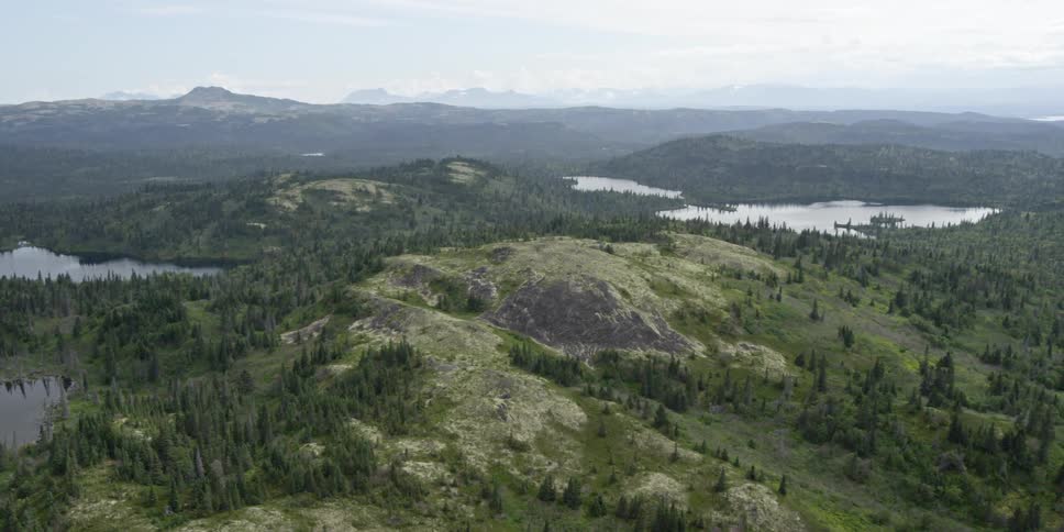 Aerial view of mountains and a body of water