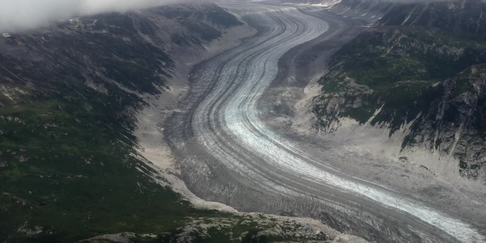 Aerial view of some mountains with snow