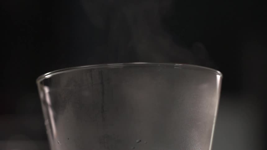 Steam rising from a beverage in a studio