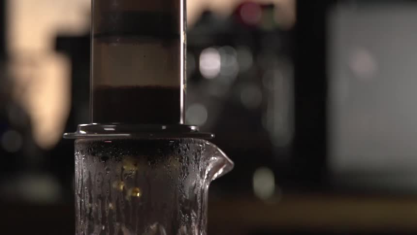 Coffee percolator makes coffee on a jar in a kitchen