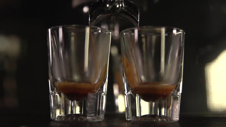 Twin spouts dispense beverage into two glasses simultaneously