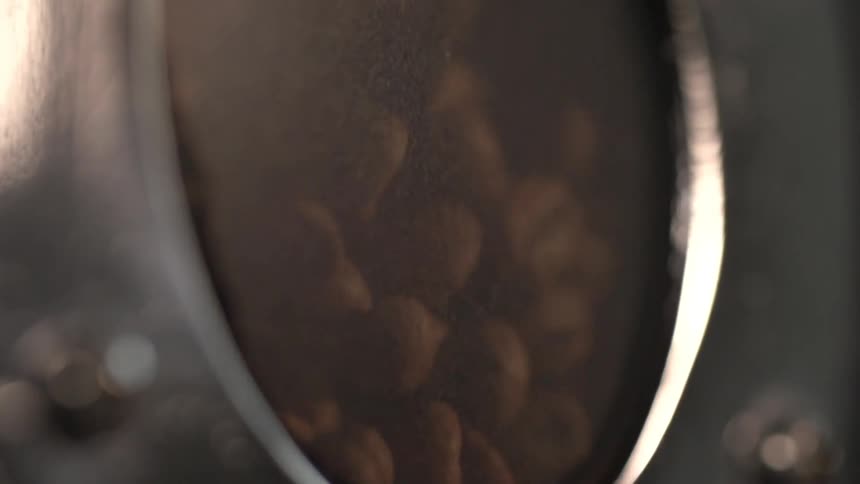 Coffee beans in a machine in a factory