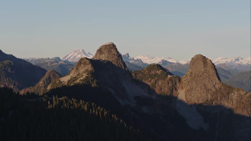 Aerial of The Lions mountain peaks at sunset