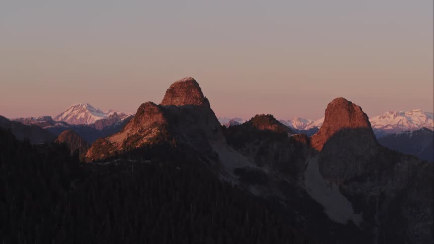 Aerial of The Lions mountain peaks at sunset 2