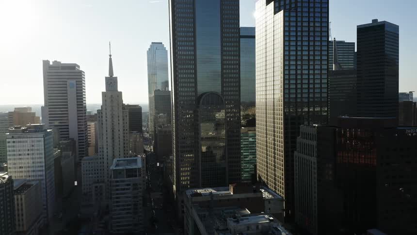 Downtown city with tall skyscrapers in daytime