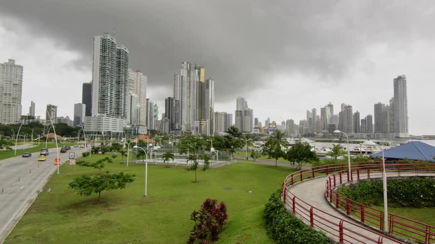 Cars driving towards a downtown area