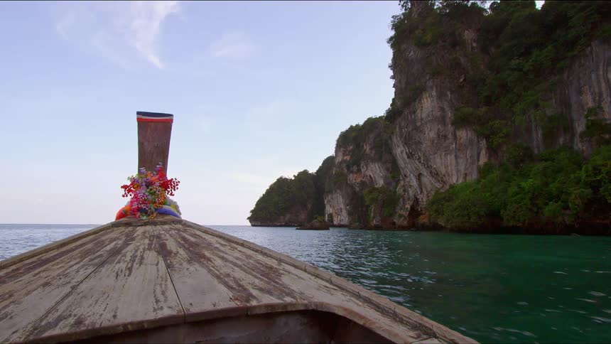 A boat is moving through the ocean