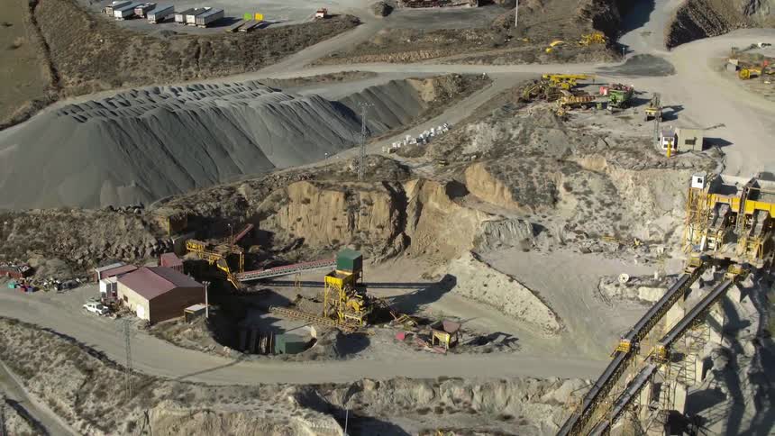 An aerial view of a construction site is displayed