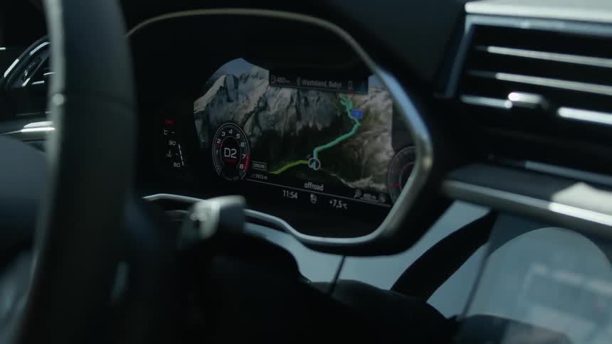 Digital display on dash behind steering wheel shows route