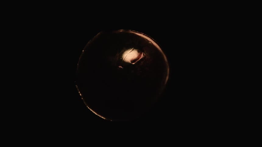 A soft round sphere explodes in liquid