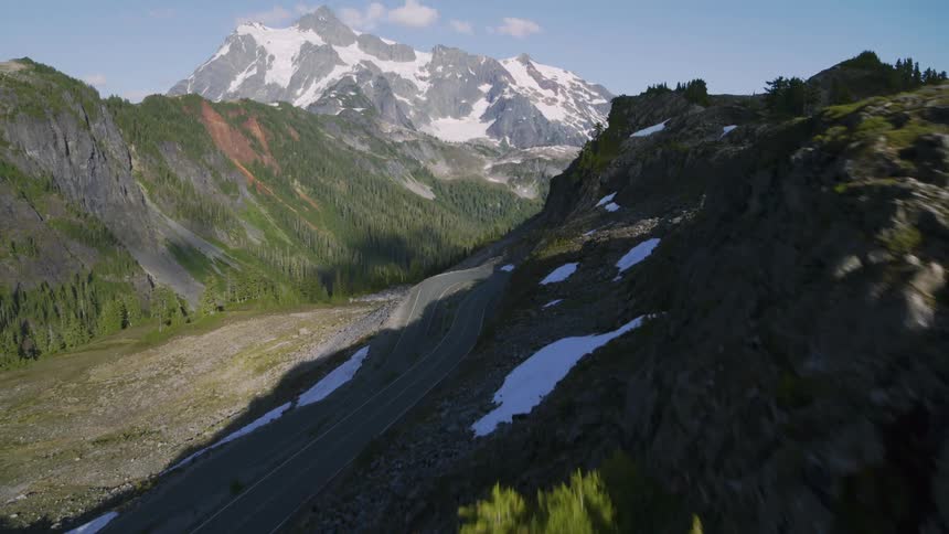 Revealing a sharp hairpin curve along a steep mountainside road