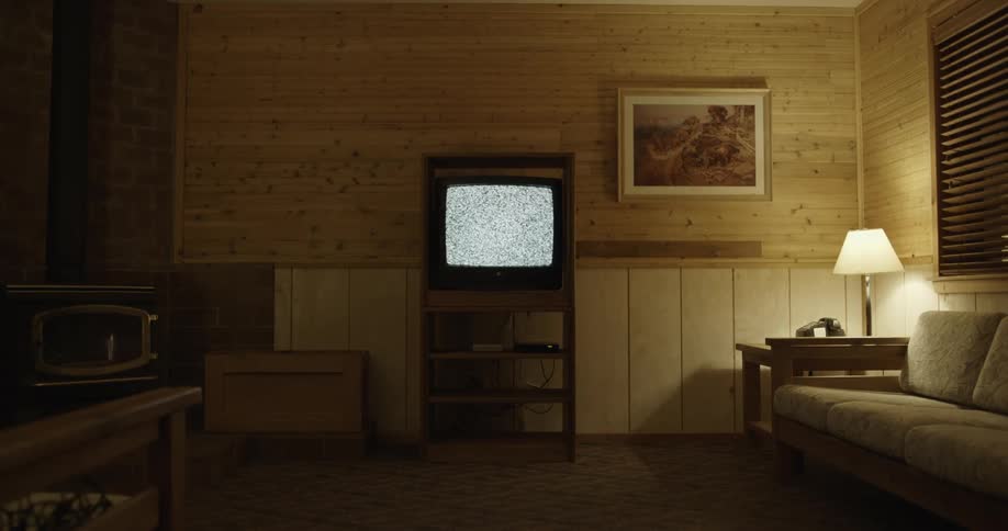 A broken television in a living room