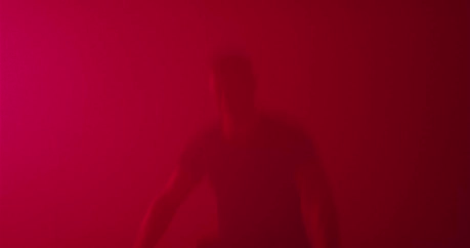 A man jumps up and down