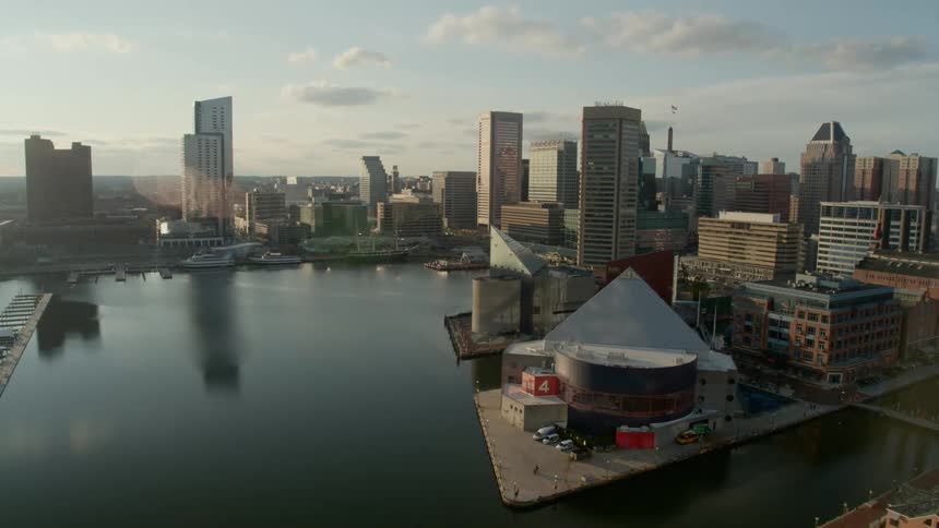 A downtown part of the city sits next to a harbor