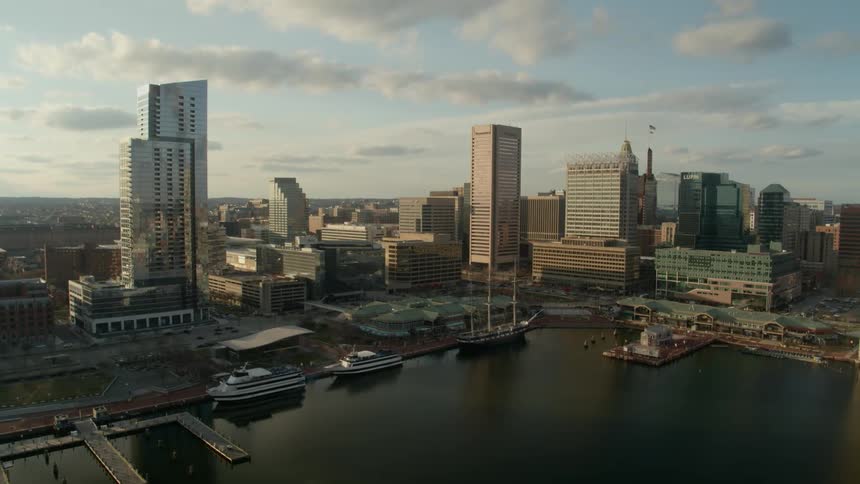 An aerial view of a downtown city is displayed