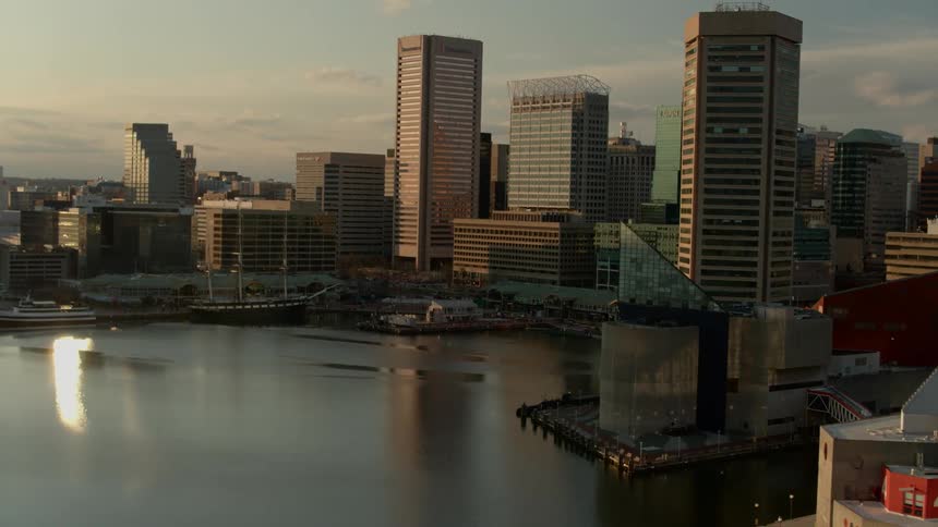 The early morning sun illuminates a quiet downtown area