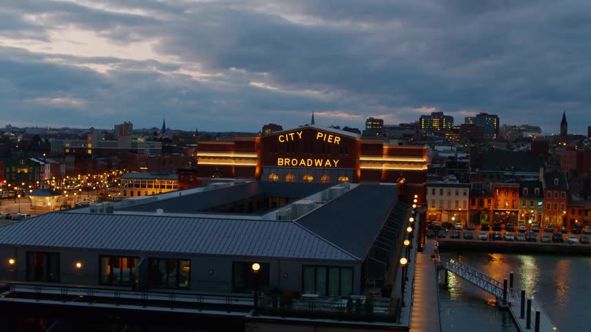 A downtown city is displayed at night