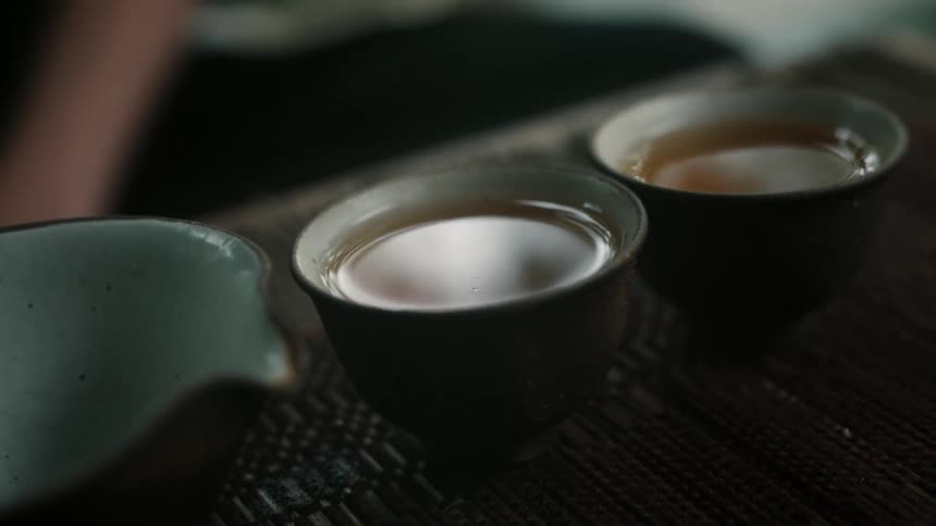 Tea in two small stoneware teacups