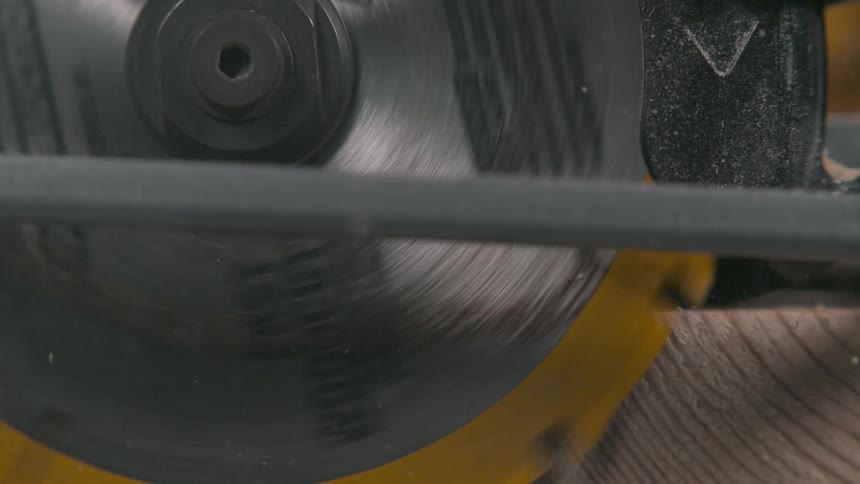 A electric saw cutting wood