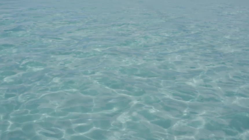 Blue water under sunshine