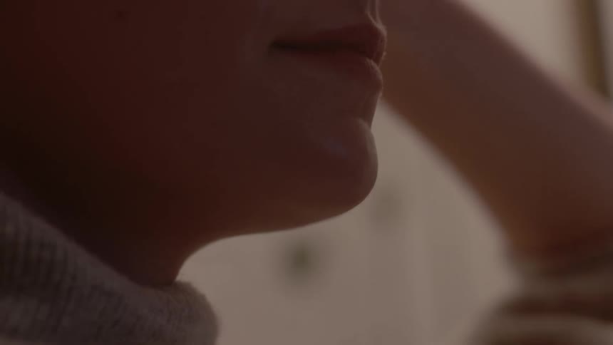 A woman staring off into the distance