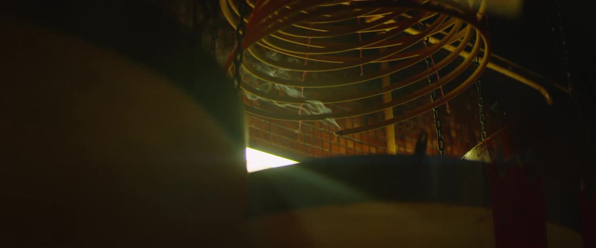 A coil bug repellent smokes as it burns
