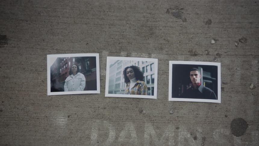 Photos of three people lined up against rough beige surface with words