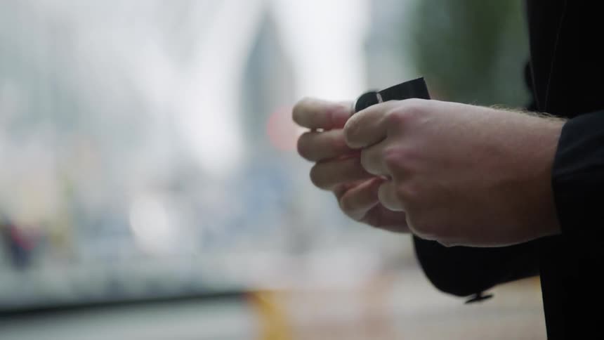 A man writes on a film canister