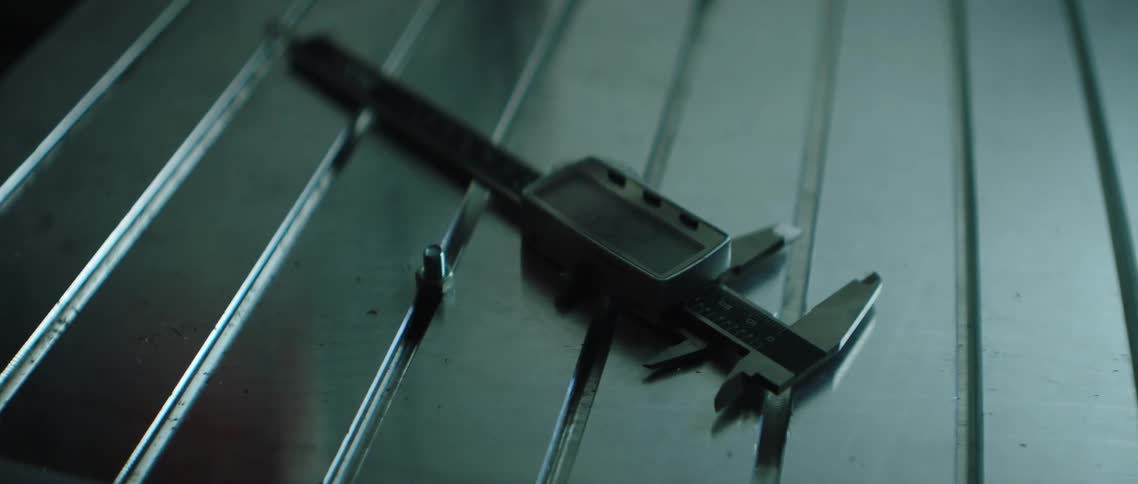 Metal hand tool on metal surface