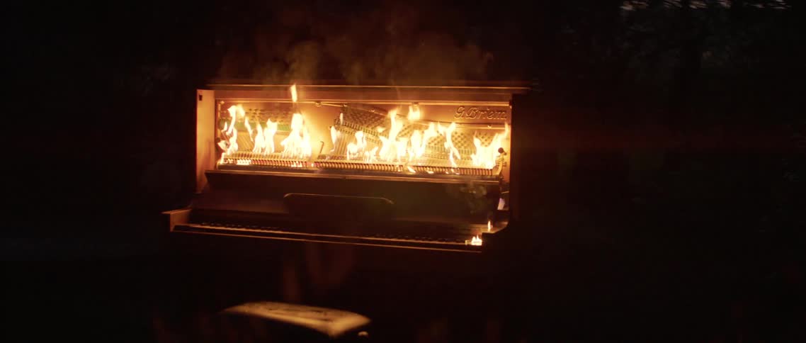 The flames sit on the piano