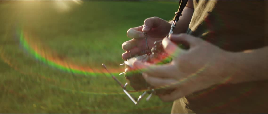 A man holds a drone