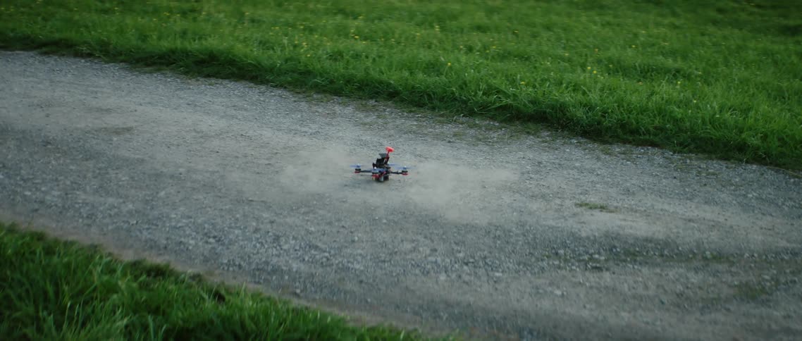 A drone lifts off the ground